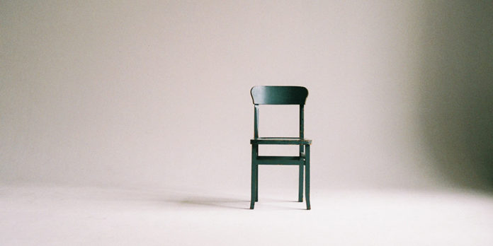 green-wooden-chair-on-white-surface-963486