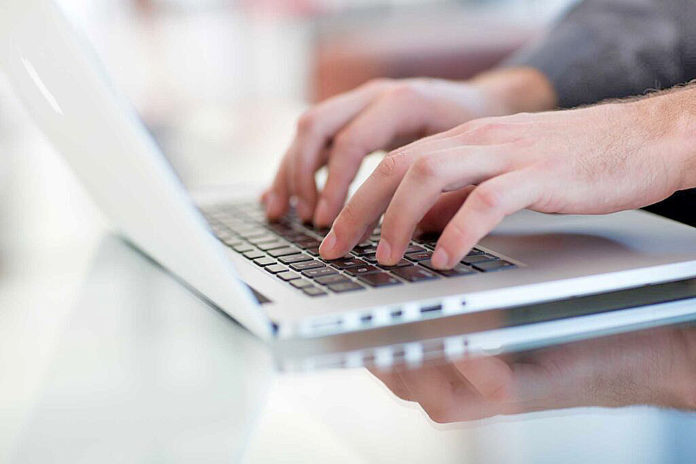 Work on a laptop - as always, the programmer pretends to work